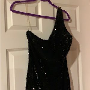 A beautiful full length formal dress.